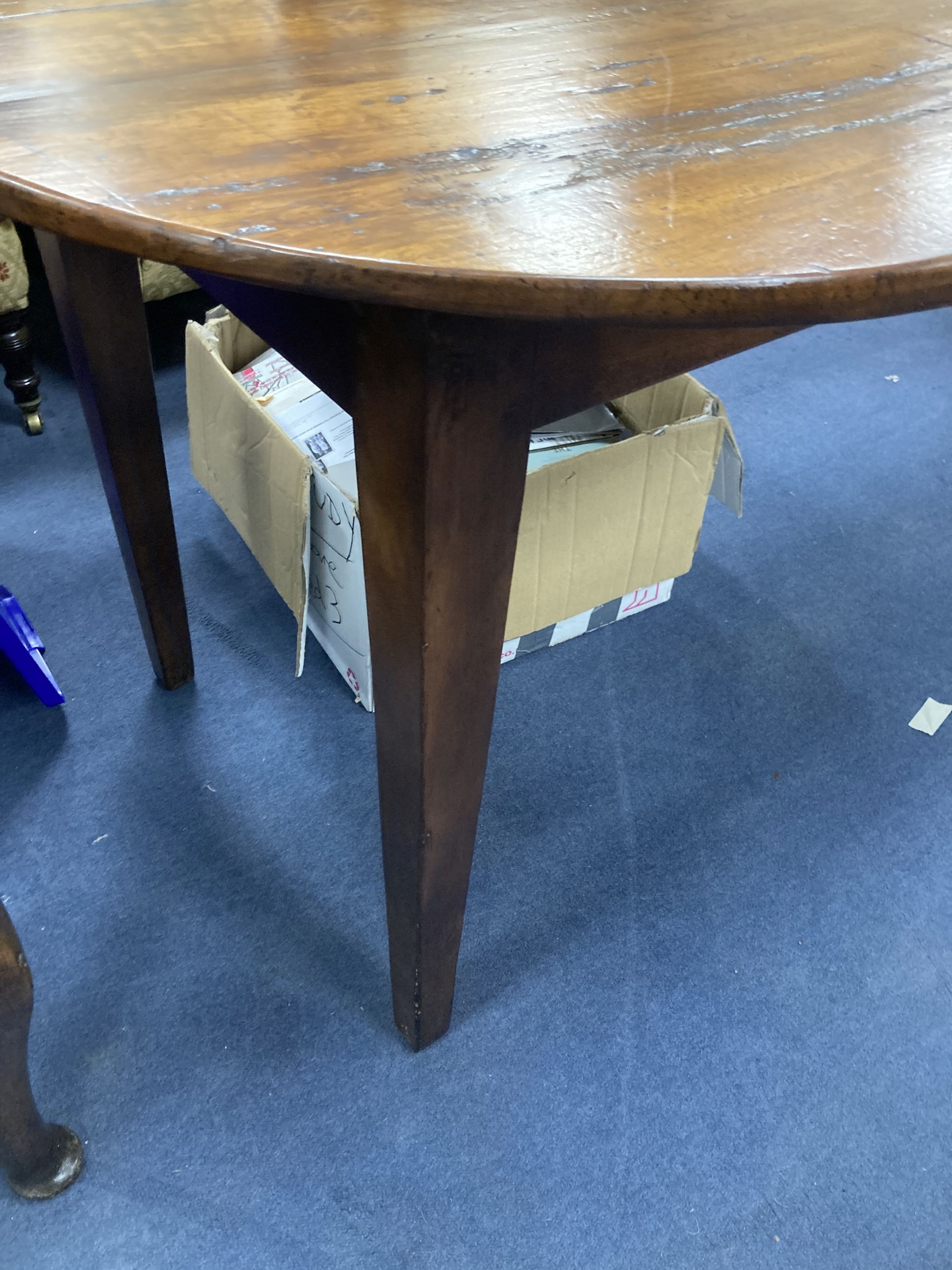 A 19th century fruitwood provincial dining table on square tapered legs, length 210cm, depth 90cm, height 77cm